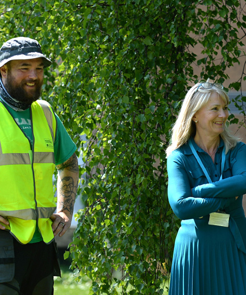 Shirley Congdon, Vice-Chancellor at the University of Bradford with students at an archaeological digsite.