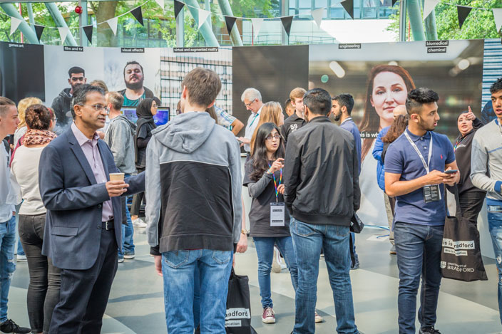 Students and staff members gathered together at an Open Day event in Richmond Building.