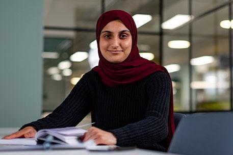 Student smiling at the camera.