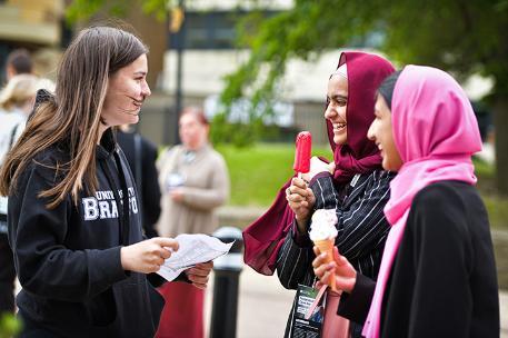 Prospective students chatting to a student ambassador