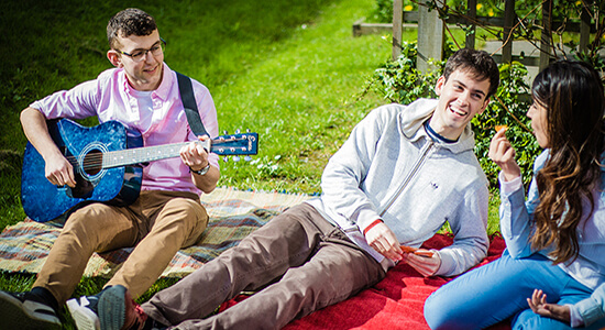 Accomodation students outside the green