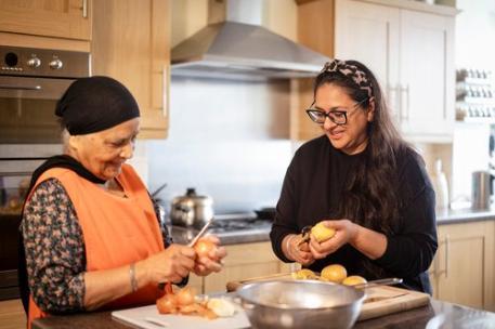 People cutting food