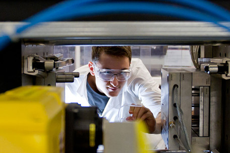 A chemical engineering student wearing googles