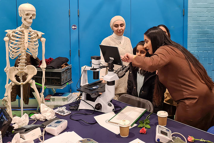 University of Bradford researchers interacting with the public at Unify 2024