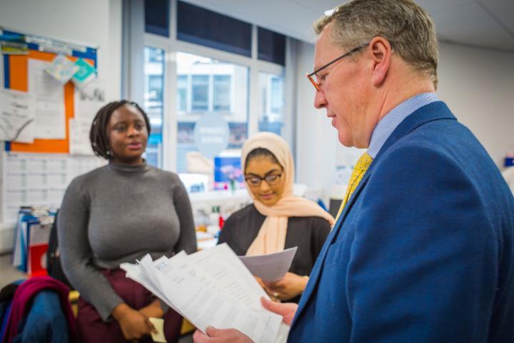 Students being mentored by lecturer at Law Clinic