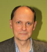 Professional style photo of Tomasz Mickiewicz, Professor, Aston Business School