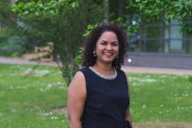 scholarship student, Roshnee stood in the peace garden on campus