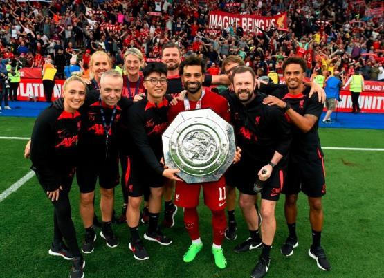 Liverpool FC head physio Chris Morgan with teammates