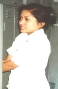 A young woman in a nurses uniform