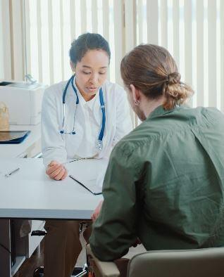 GP talking to patient