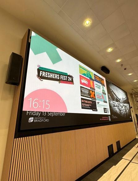 A 10 metre wide screen in a lecture theatre