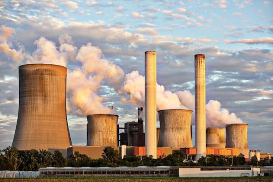 Steam rising from power station chimneys