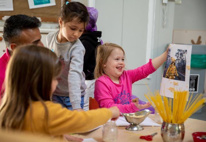 group of children in preschool room at nursery