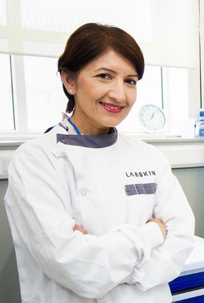 A profile picture of Dr Sobia Kauser in a laboratory