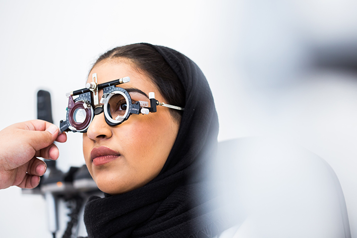 A student having an eye test