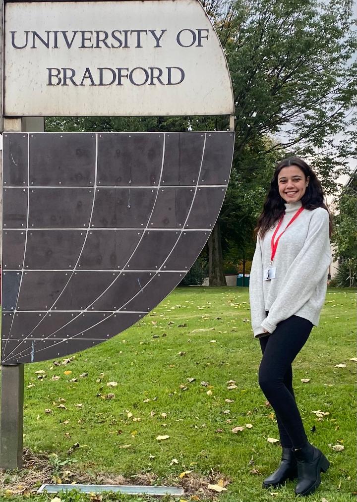 Erasmus Exchange student, Nayera Hasanen stood in front of the University statue