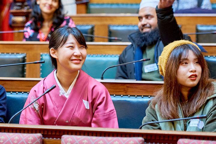 Japanese student Momo Suzuki wearing a pink kimono at the international students' welcome event