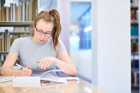 Student studying in the library