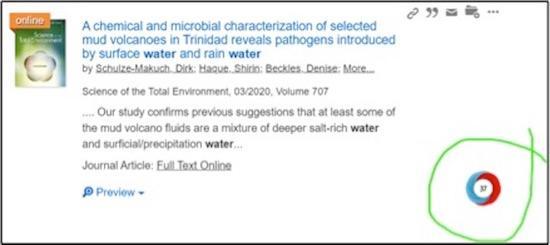Altmetrics score is show in a circle next to Summon search results.