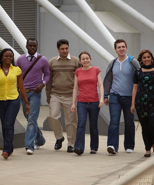 6 students walking in a line.