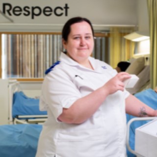 Support returning to study whatever shape your journey took - Graduate nurse standing in a ward