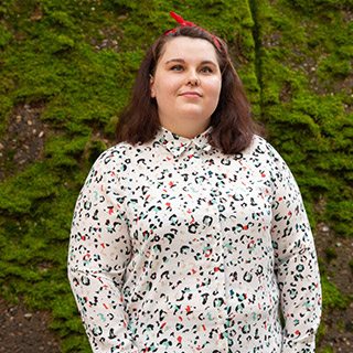 Student smiling at the camera