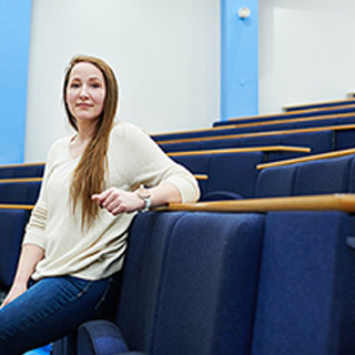 Tina, chemical engineering student, smiling at the camera.